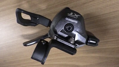 SHIMANO XT SL-M8000 LEFT SHIFTER, 2 RING, NEW, BLACK, WITH BRAKE ATTACHEMENT - Image 1 of 2