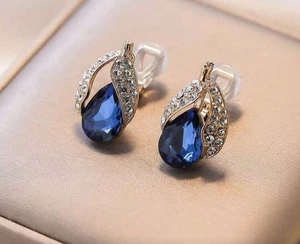 Clip on 1" gold, blue and clear stone cutout teardrop earrings - Picture 1 of 4