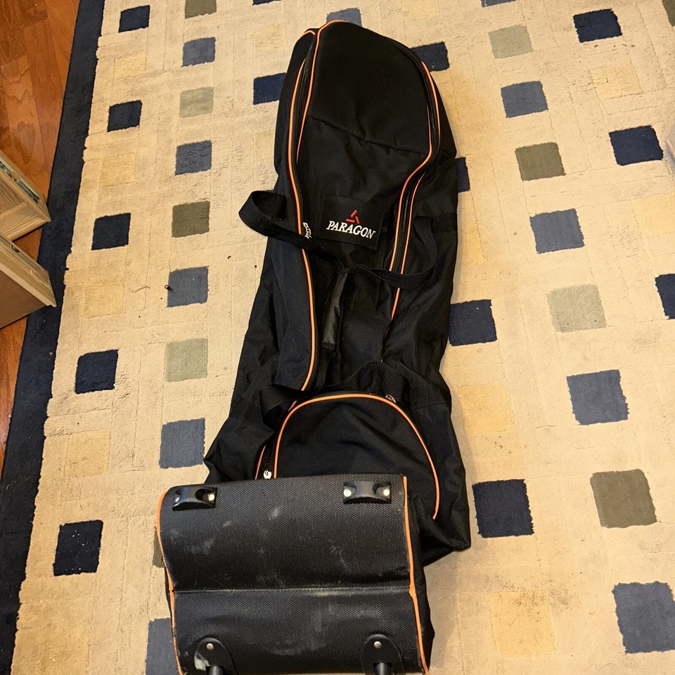 Bolsa de viaje de golf con ruedas Paragon estuche blando negro con borde naranja excelente estado Foto 1 de 4