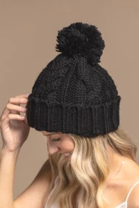 Gorro de ganchillo Ruggine tejido con cable pompón sombrero de invierno en negro - Imagen 1 de 2
