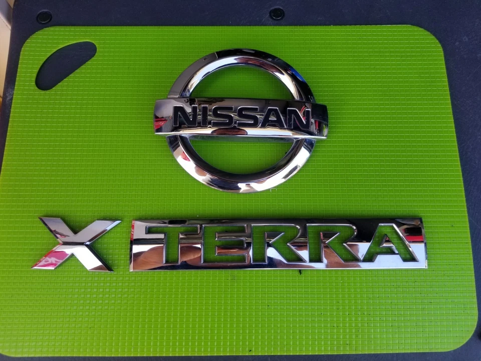05 06 07 08 09 10 11 12 NISSAN XTERRA Rear Trunk Emblem Logo Badge OEM - Image 1 of 1