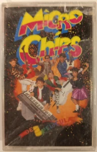 MICROCHIPS - DE PELICULA - 1989 MEXICAN TAPE ALBUM, STILL SEALED, LATIN POP - Picture 1 of 2