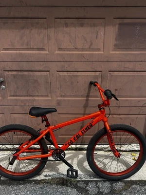 Bicicleta BMX SE 24", So Cal Flyer, naranja, pagó $680 arañazos menores, (comercios/efectivo) Foto 1 de 3