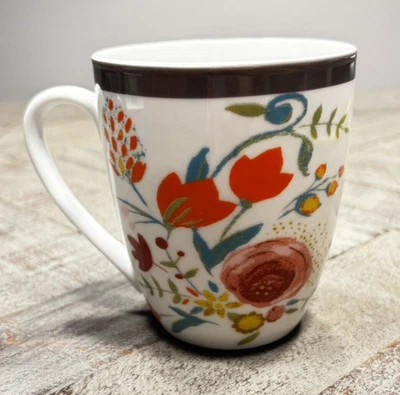 Taza floral arte popular borde gris multicolor flores silvestres interior taza de té café Foto 1 de 4