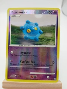 Tarjeta Pokémon Bronzor 52/100 - Majestic Dawn - Holograma inverso común LP, 2008 - Imagen 1 de 7