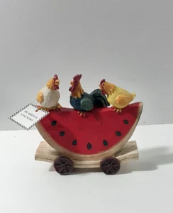 Resin Figurine Three Chickens Perched On A Watermelon Slice On A Wheeled Base - Picture 1 of 6