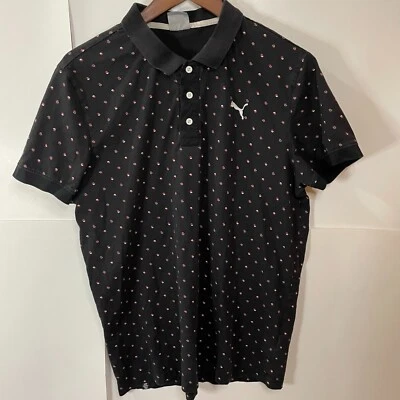 Polo de manga corta PUMA para hombre talla XL negro con manchas blancas rojas Foto 1 de 4