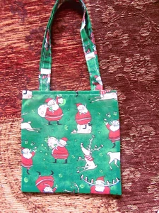 HANDGEMACHTE WEIHNACHTSTASCHE FÜR KINDER MIT ORANGEFARBENEM BAUMWOLLFUTTER - 7 3/4" x 8" - Bild 1 von 3