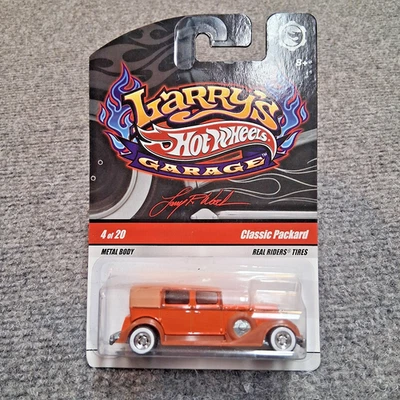 1/64 Hot Wheels Larry's Garage Classic Packard/Naranja-Marrón Guardabarros/Real Rider Foto 1 de 4