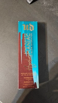Hidratante Urban Decay Hydromaniac Tintado Brillo Tono 90 Ultra Profundo 1.1 fl oz Foto 1 de 2