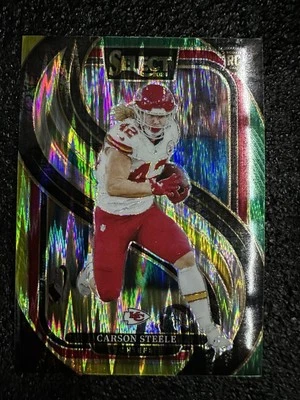 2024 Select Carson Steele Green Yellow Shock Prizm Rc #142 Premier Level  - Image 1 of 4