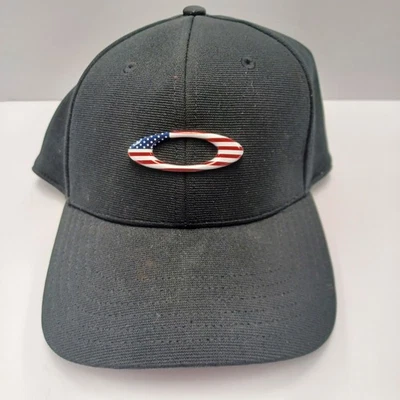Gorra negra Oakley TinCan logotipo bandera americana ajuste flexible elástica talla S/M Foto 1 de 4