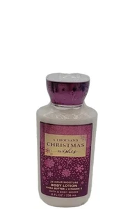 Bath & Body Works A Thousand Christmas Wishes 24-Stunden-Feuchtigkeits-Körperlotion 8 fl. Oz. - Bild 1 von 4