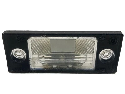 Conjunto de luces de matrícula traseras izquierda o derecha Volkswagen Tiguan 2009-2014 OEM Foto 1 de 4