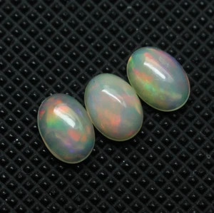 Opal Cabochon Gemstone Natural Ethiopian Opal Oval Cabochon Set Loose Opal 7X5MM - Picture 1 of 7