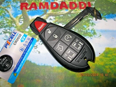 MINT Condition OEM Unlocked Town & Country 5026197 Key Fob Fobik 7 Button Remote - Image 1 of 3