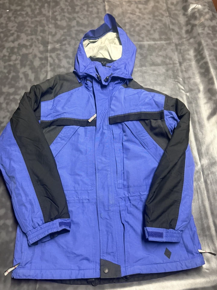 Chaqueta esquí diamante negro para hombre grande azul con detalles negros. Foto 1 de 4