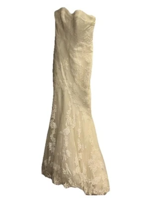 Vestido de novia blanco marfil sin mangas de encaje cuello en V trompeta piso completo tren Foto 1 de 3