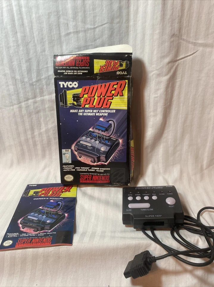TYCO POWER PLUG For SUPER NINTENDO SNES Thrash AUTO FIRE TURBO OPEN BOX - Image 1 of 4