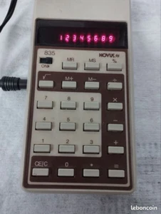 calculatrice vintage novus 835 vintage (1976) affichage LED avec adaptateur sect - Photo 1/5
