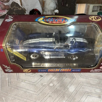 Coche fundido a presión Shelby Cobra 427 S/c 1964 colección 1:18 Foto 1 de 4