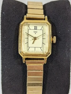 QQ Manual Mechanical Gold Tone Dial Rectangle Case Stainless Stretch Band Watch - Picture 1 of 7