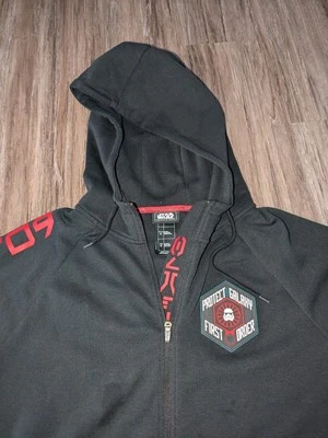Star Wars Galaxy's Edge Disney 709 Proteger la Primera Orden de la Galaxia Sudadera con Capucha XL Foto 1 de 4