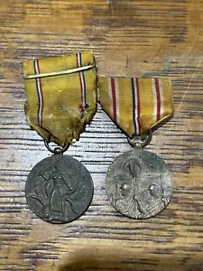 Lotto medaglia della difesa americana seconda guerra mondiale e medaglia della campagna Asia-Pacifico - Foto 1 di 2