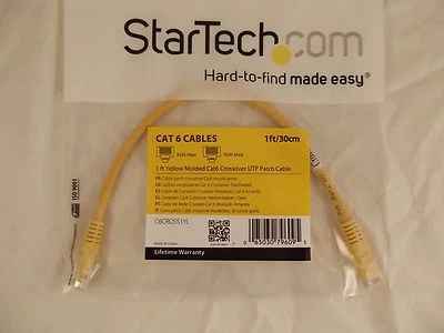 StarTech C6CROSS1YL Yellow Molded Cat6 Crossover UTP Patch Cable 1 ft. 28-4 - Image 1 of 2