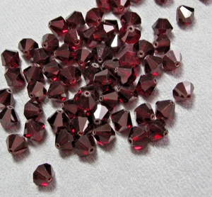 Granat Swarovski Kristall Perlen Doppelkegel 8 mm - Bild 1 von 3