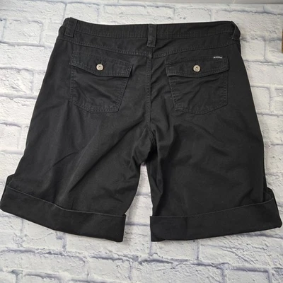 Pantalones cortos de mezclilla para mujer Riders negros puño con pestañas talla 16M pequeños bolsillos con solapa con botones Foto 1 de 4