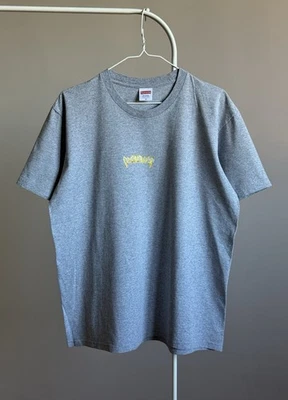 Camiseta Supreme Grill dorada Foto 1 de 4