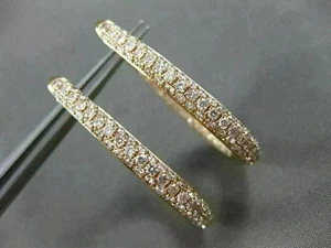 Orecchino a cerchio interno in vera moissanite taglio tondo placcato oro giallo 14 carati 2 ct - Foto 1 di 4
