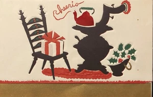 Vintage Weihnachtsgrußkarte Topfbauch Herd glänzend rot Wasserkocher Stuhl mit Geschenk - Bild 1 von 3