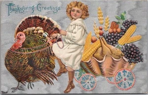 1910 THANKSGIVING Postcard Little Girl & Turkey Pulling Large Shell Cart / Food - Picture 1 of 2
