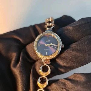 Q&Q Ladies Watch with Diamante Stones and Purple Dial - Picture 1 of 9