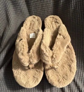 Adult NWOT "UGG" brown, fuzzy flip flips. Size 11 - Picture 1 of 3