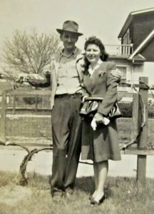 Man With Hat & Woman In Dress Standing By Fence House B&W Photograph 5 x 7 - Picture 1 of 3