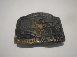 VINTAGE BRASS BELT BUCKLE Old Truckers Never Die They Get A New PETERBILT - Picture 1 of 5