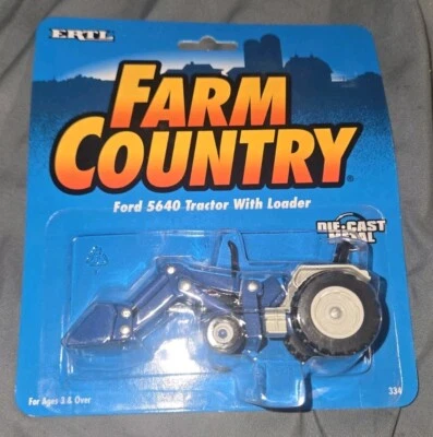 ERTL 1/64 Ford 5640 with Loader #334  - Image 1 of 4