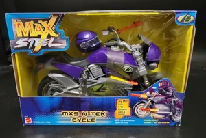 Max Steel MX9 N-Tek ciclo púrpura sin sonido/luces Mattel 2000 sin usar, en caja todavía sellado - Imagen 1 de 8