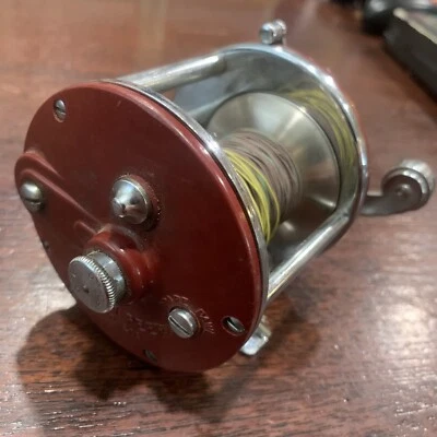 Carrete de pesca Penn No 209 nivel viento agua dulce/salada EE. UU. funciona muy bien Foto 1 de 4