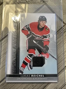2022-23 UD SP Authentic Hockey Lukas Reichel SP Rookie Authentics Jersey Patch - Picture 1 of 3