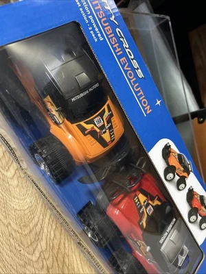 ИГРУШЕЧНЫЕ ГРУЗОВИКИ MITSUBISHI EVOLUTION С ФРИКЦИОННЫМ ПРИВОДОМ 2 ГРУЗОВИКА КРАСНЫЕ И СИНИЕ - Изображение 1 из 4