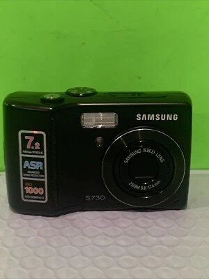 Cámara digital SAMSUNG S730 - Utiliza pilas AA - Probada solo para pieza como está Foto 1 de 4