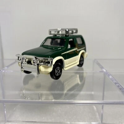 Tomy Tomica Mitsubishi Pajero (RV) металлический верх масштаб 1:61 литой внедорожник темно-зеленый - Изображение 1 из 4