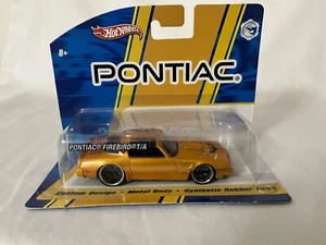 Hot Wheels Pontiac Firebird T/A Gold Mid-Scale 1:50 - Picture 1 of 3