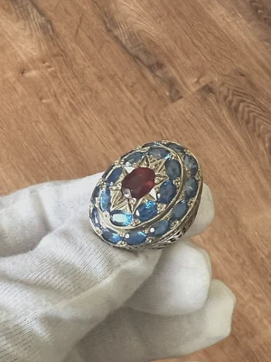 CUSTOM HANDMADE MEN'S SILVER RING WITH 20 TOPAZ AROUND A RUBY توباز / روبي - Image 1 of 4