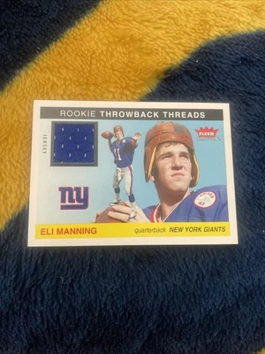 Camiseta deportiva Fleer Tradition 2004 Rookie Throwback Threads #TTEM Eli Manning azul ¡NFL! Foto 1 de 2
