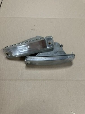 Lente de señal de parachoques para conductor y pasajero Acura Integra 1990-1993 4 puertas (OEM) Foto 1 de 4